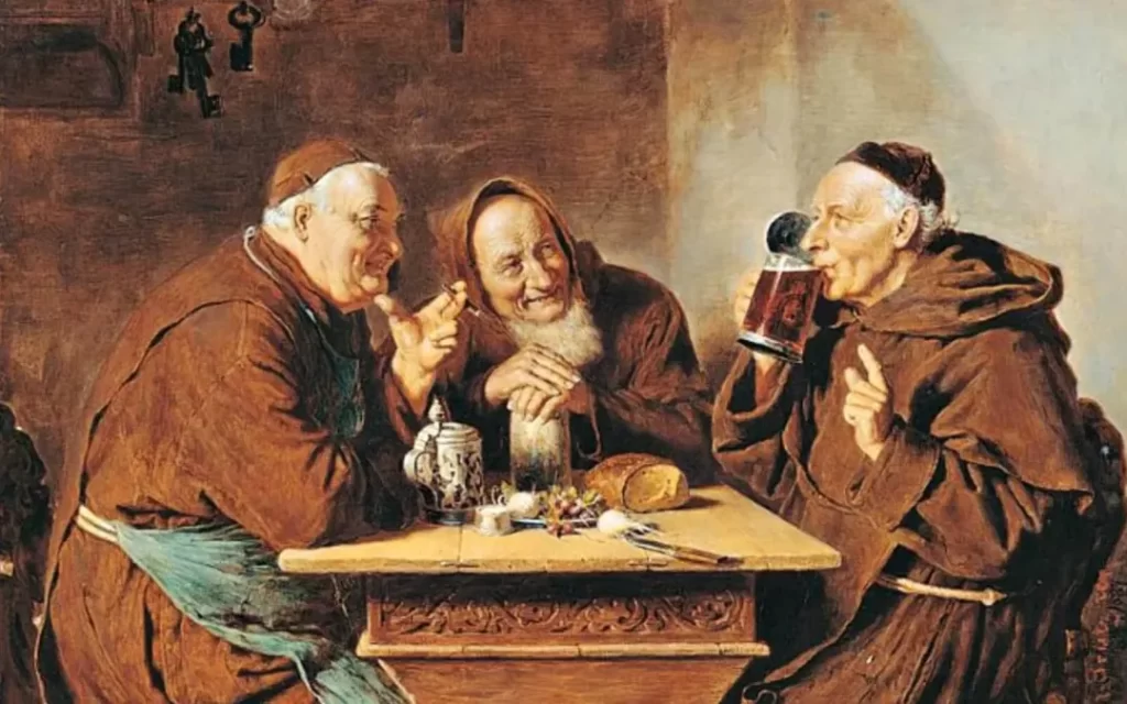 Monges medievais degustando uma caneca de cerveja artesanal.